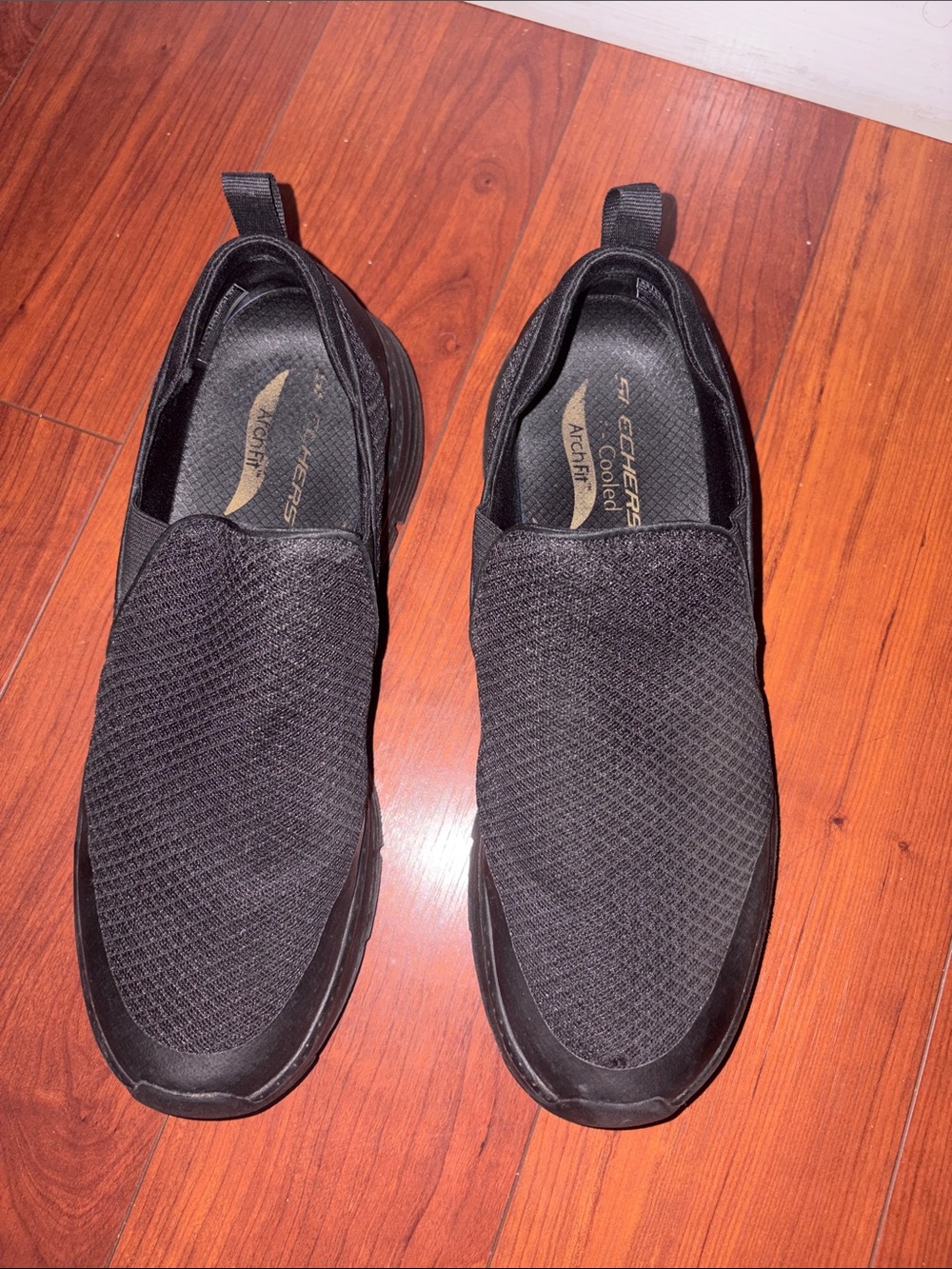 Skechers Men’s Black Slip-On Mesh Sneakers